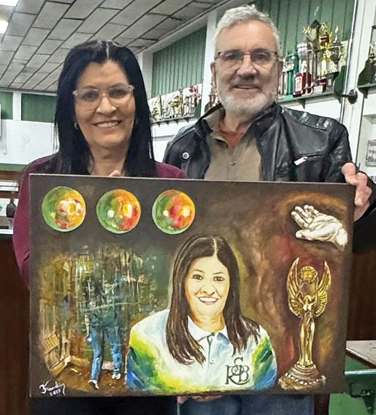 Um quadro para reverenciar a campeã Gina Hickmann